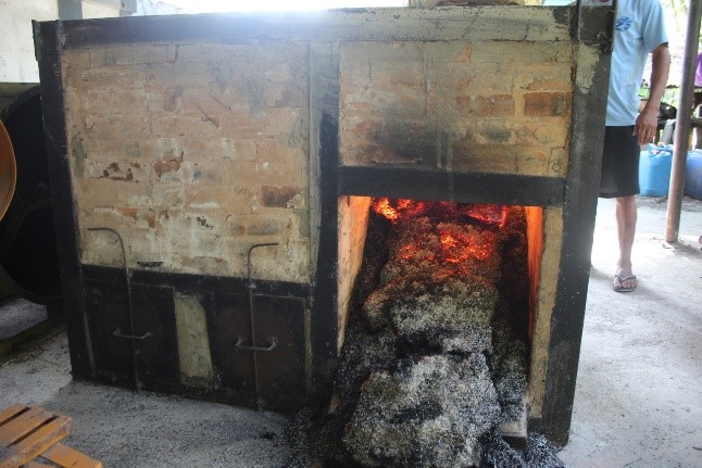 Modern Lambanog (local wine from Nypa frutescens, a riverine mangrove species) Distillery using rice hull as fuel for the distillation process