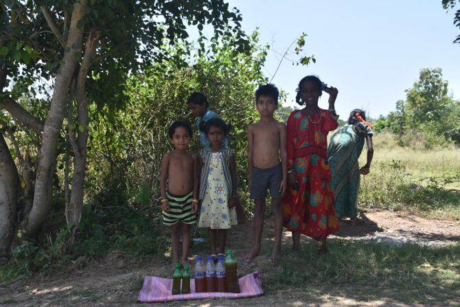 Tribal people selling honey for livelihood